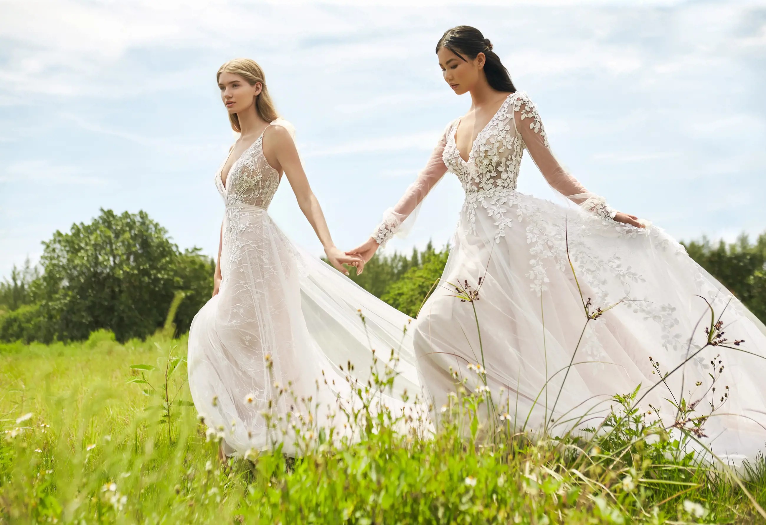 Models wearing a white gowns